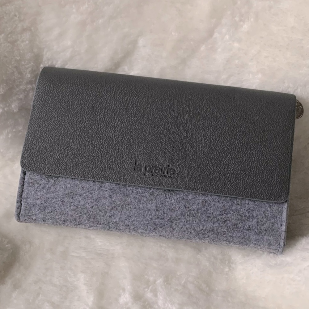 La prairie faux leather wool felt makeup clutch